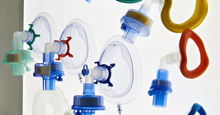 Assorted respirator masks and filters displayed against a light background.